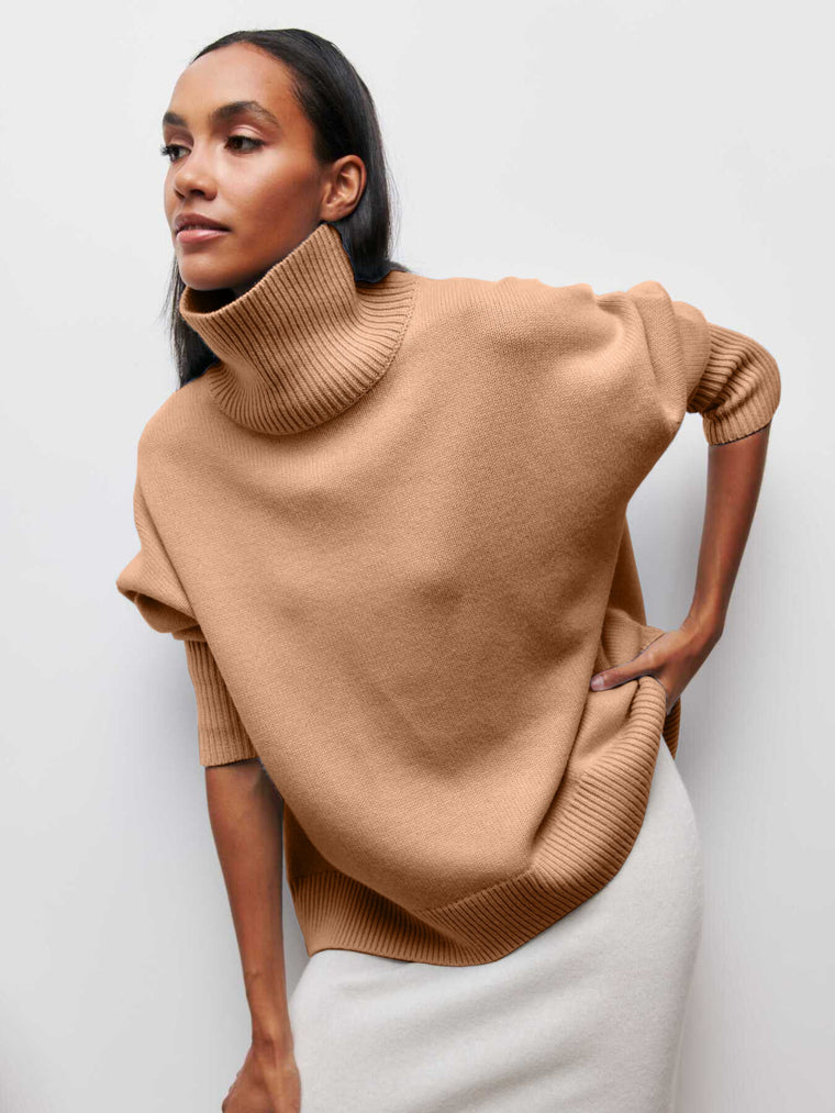Oversized trui met hoge col en ribgebreide afwerking