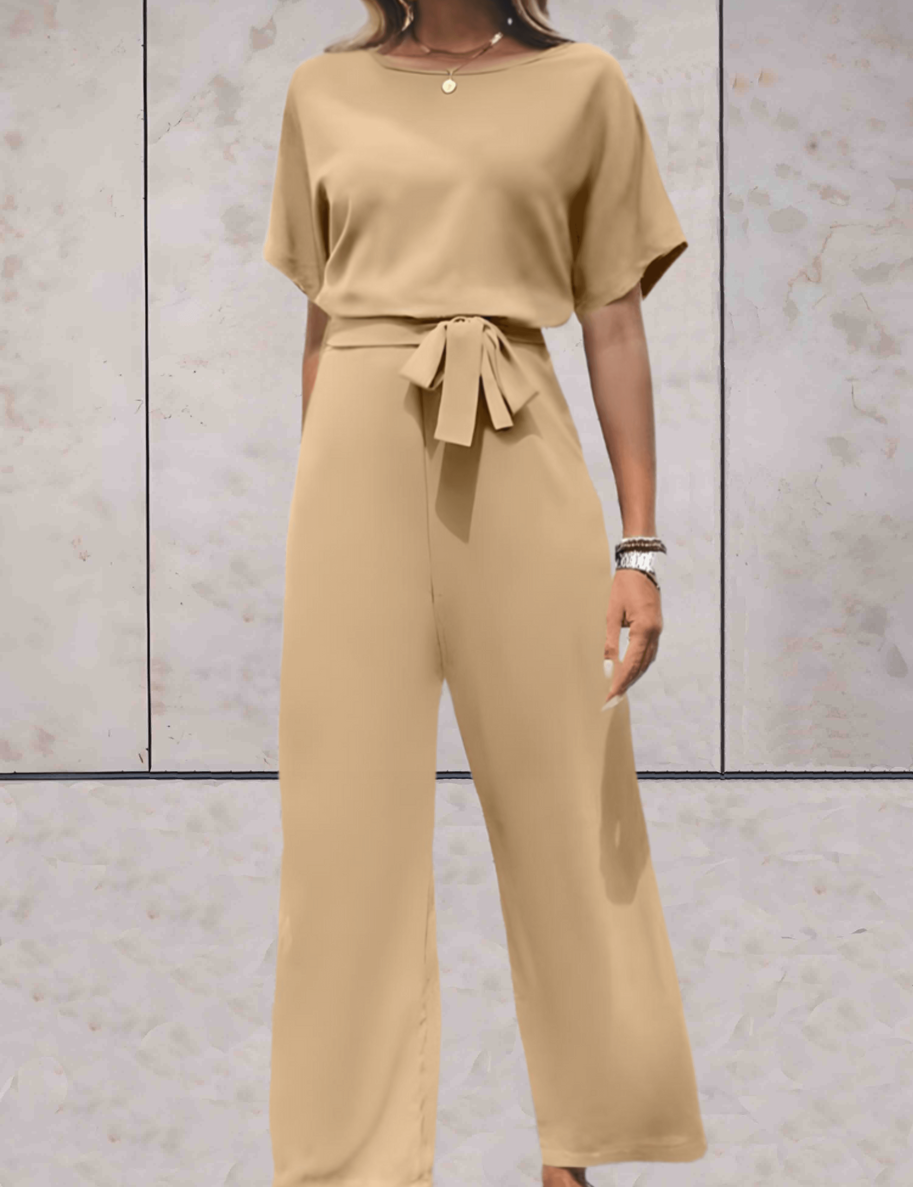 Paige - Effen jumpsuit met korte en wijde mouwen, striklinten aan de zijkant en druppelvormige opening aan de achterkant - Sky-Sense
