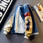 Patchwork jas met geborduurde details