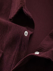 Ribfluweel jas met dubbele rij knopen