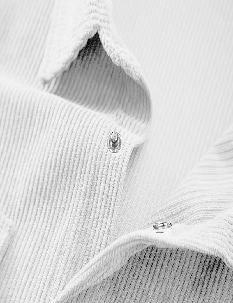 Ribfluweel jas met dubbele rij knopen