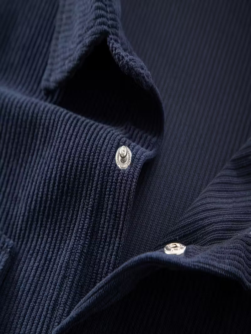 Ribfluweel jas met dubbele rij knopen