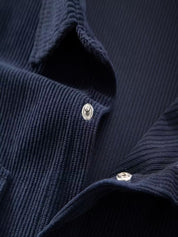 Ribfluweel jas met dubbele rij knopen