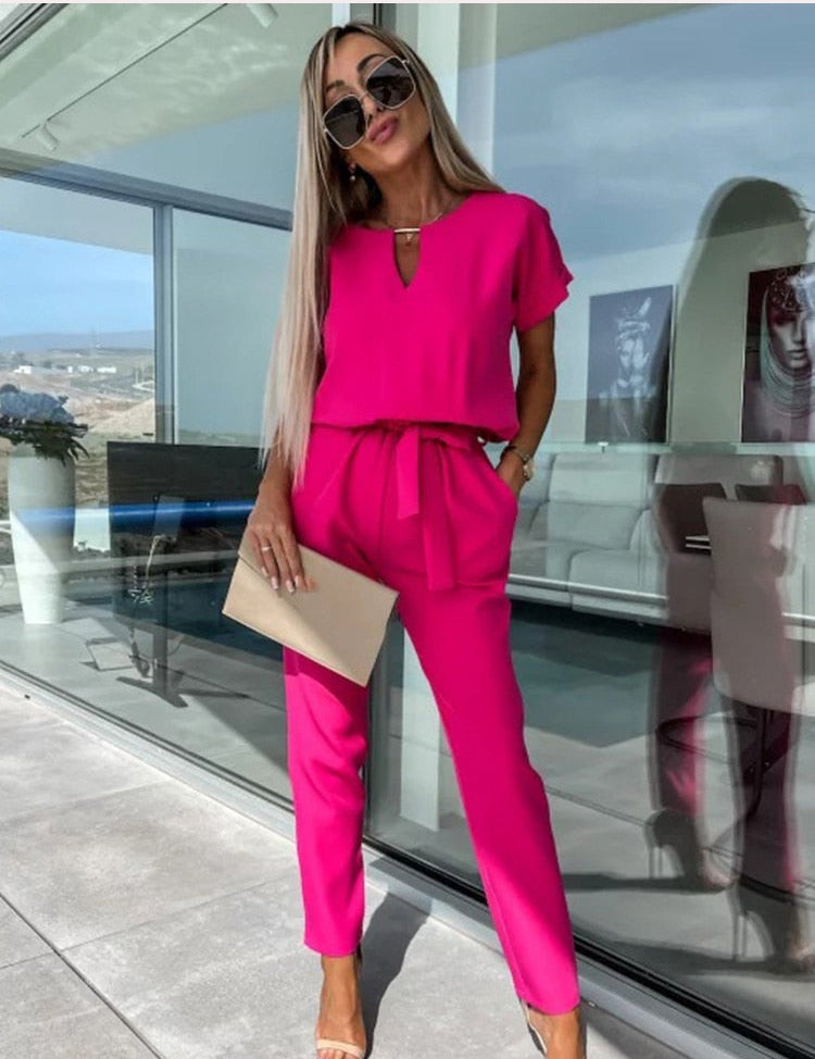 Stijlvolle Jumpsuit met Korte Mouwen en Trendy Ceintuur