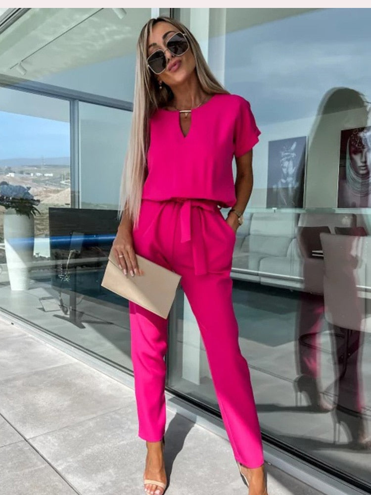 Stijlvolle Jumpsuit met Korte Mouwen en Trendy Ceintuur