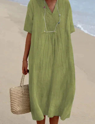 Linnen jurk gemaakt van hoogwaardig materiaal voor ultiem comfort en duurzaamheid. Een perfecte aanvulling op je zomeroutfit, met een uniek en elegant ontwerp om je zelfvertrouwen te vergroten.
