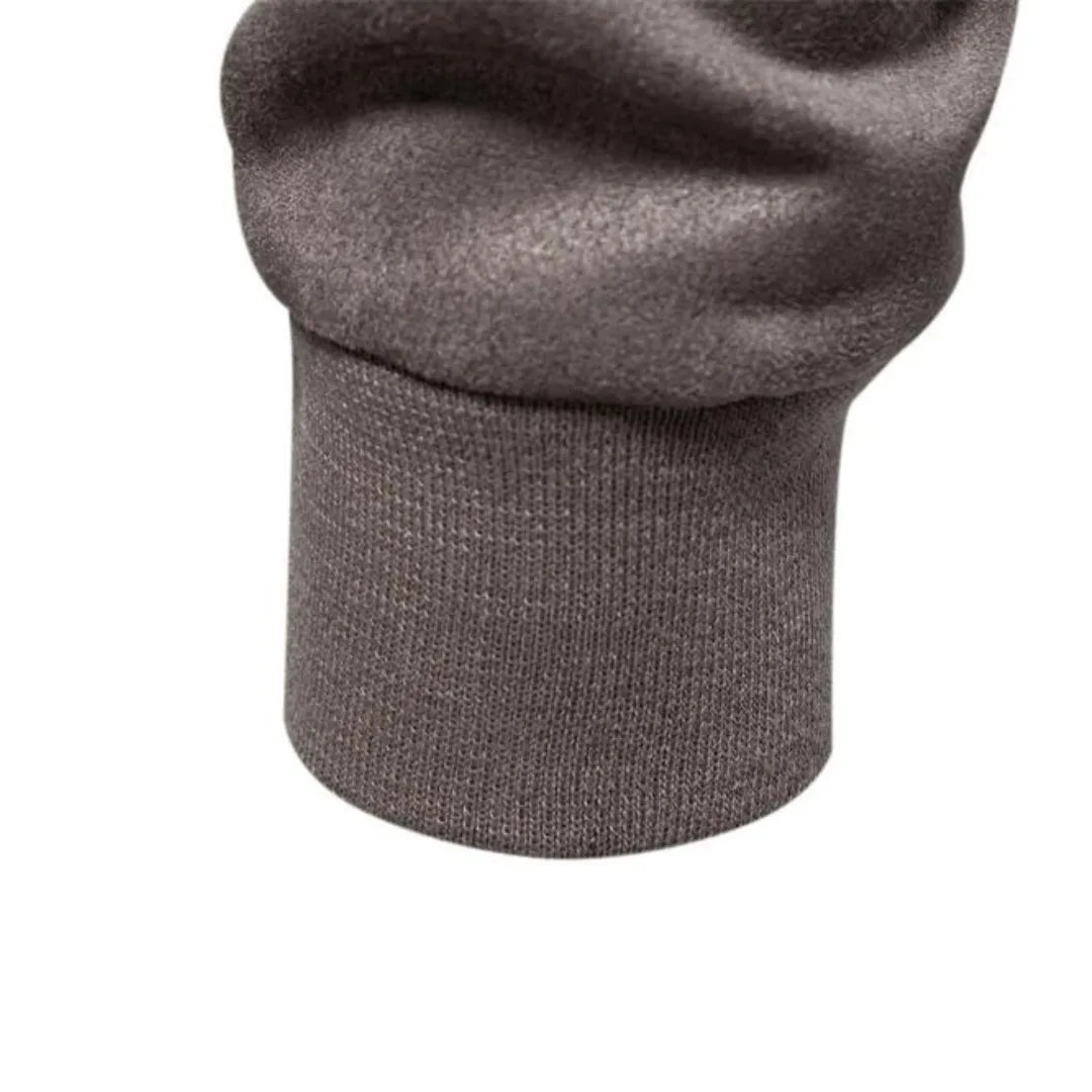 Suède bomberjack met ronde hals en drukknopen sluiting