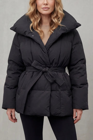 Oversized puffer jas met ceintuur