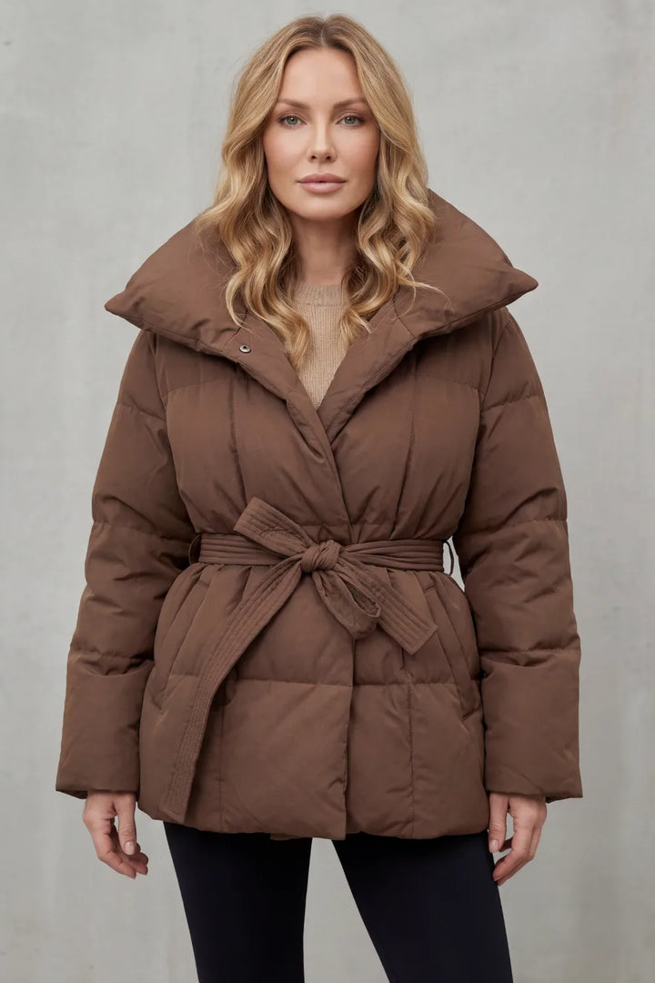Oversized puffer jas met ceintuur