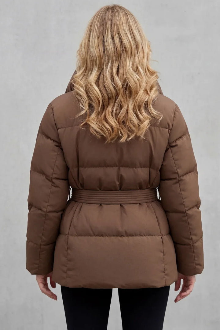 Oversized puffer jas met ceintuur
