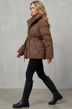Oversized puffer jas met ceintuur