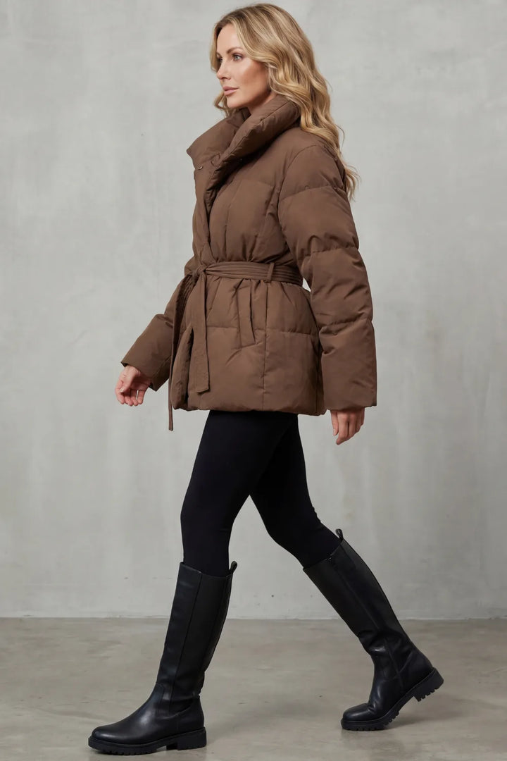 Oversized puffer jas met ceintuur