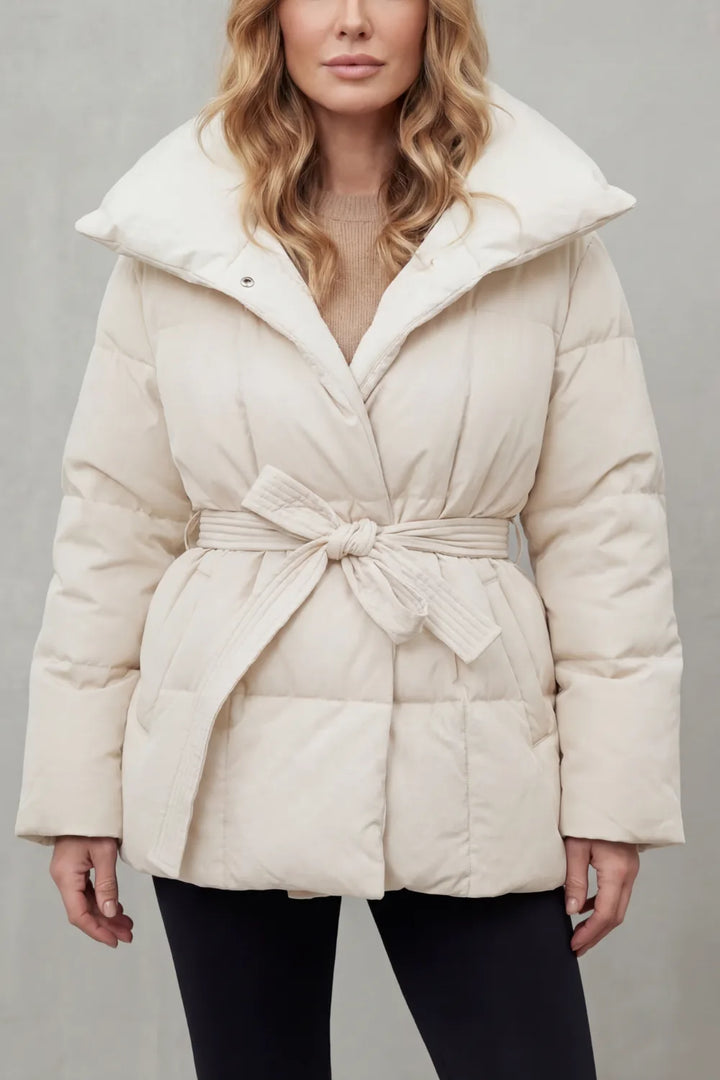 Oversized puffer jas met ceintuur