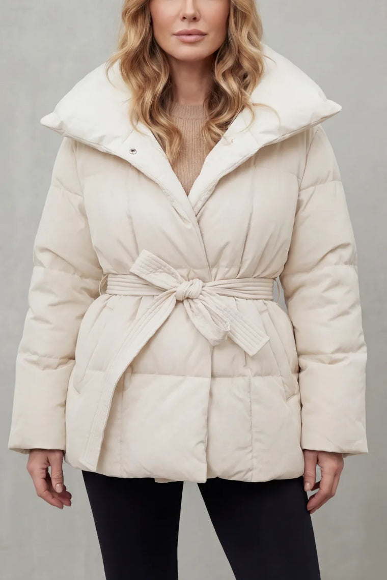 Oversized puffer jas met ceintuur