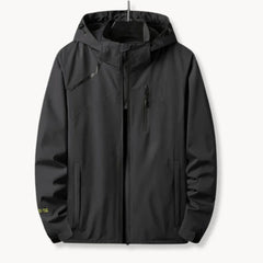 Windbreaker jas met capuchon en borstzak met rits