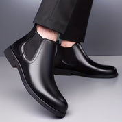 Zwarte hoge laarzen met weerbestendig bovenwerk