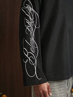 Oversized longsleeve met alfabetische print