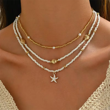 Ketting met schelp en ster
