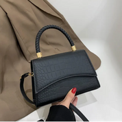 Andrea Handtas | Met handige bovenhandvat in de kleur Zwart voor dames in stijl geschikt voor alle seizoenen.