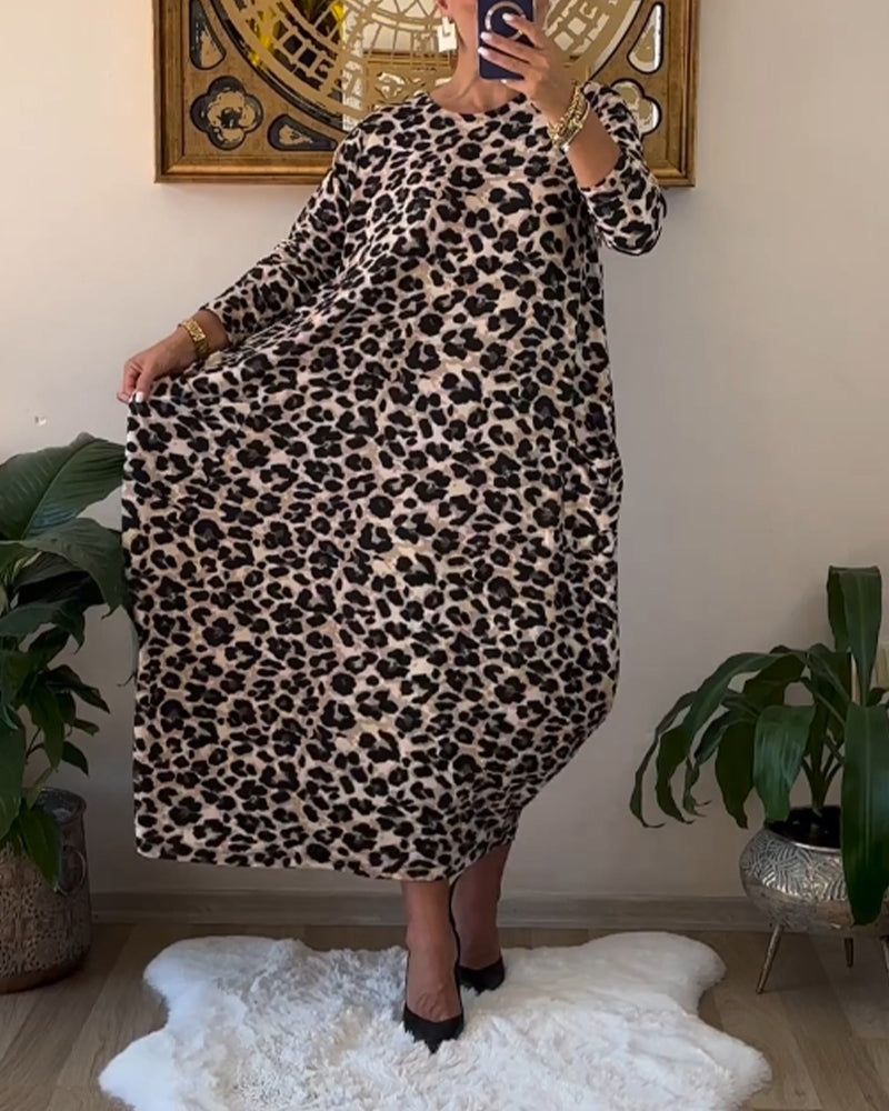 Aritia | Elegante Jurk met zakken en luipaardprint in de kleur Zwart voor dames in stijl ideaal voor de herfst.