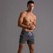Super-stretch fitness shorts voor heren - ultieme flexibiliteit en comfort voor diverse soorten workouts en ontspanning.