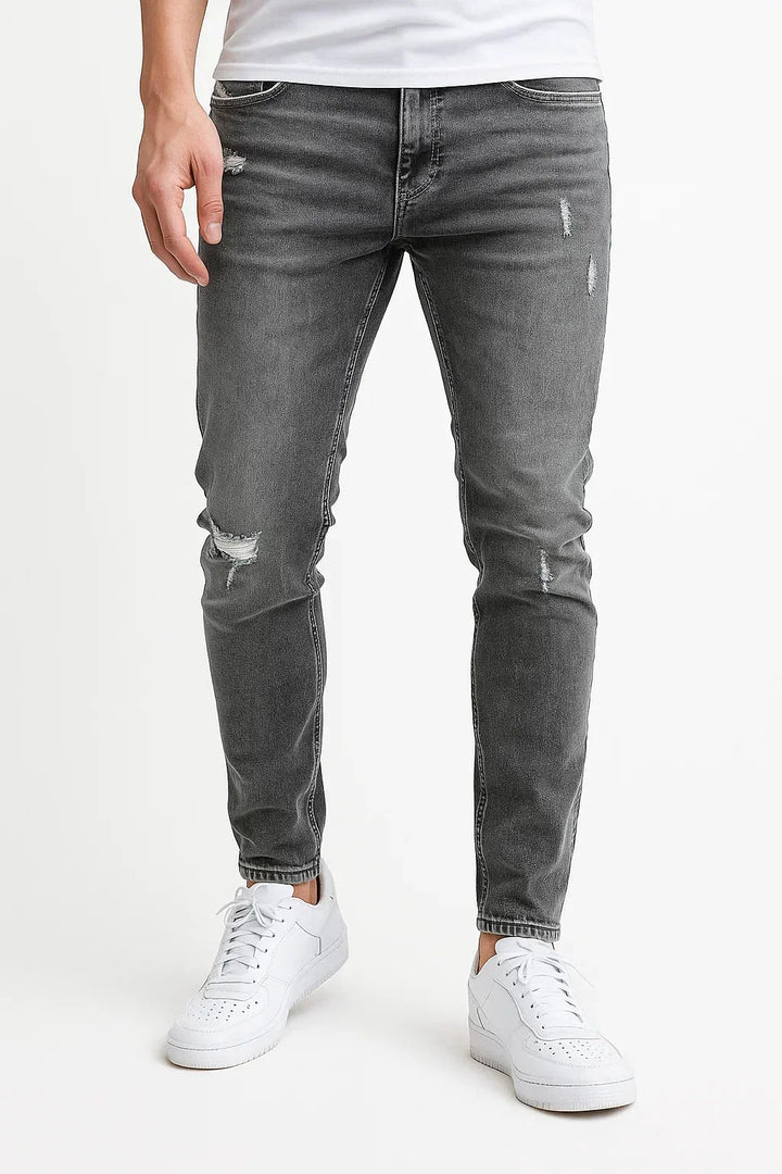 Slim fit jeans met distressed details