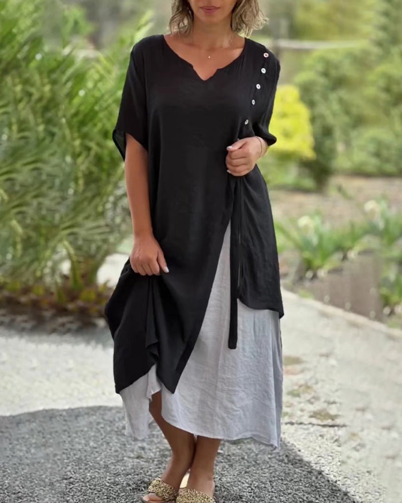 Asymmetrische Jurk in de kleur Zwart voor dames in stijl ideaal voor de lente.
