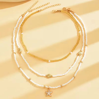 Ketting met schelp en ster