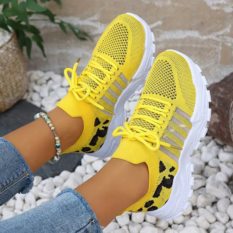 Lage sneaker met leopard print