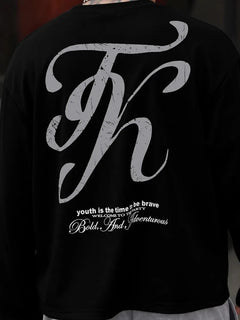Oversized longsleeve met graphic slogan