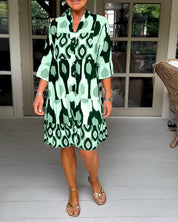 Bedrukte jurk met 3/4 mouwen in de kleur Groen voor dames in stijl ideaal voor de lente.