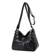 Carly Messenger Tas | Praktisch & vintage in de kleur Zwart voor dames in stijl geschikt voor alle seizoenen.