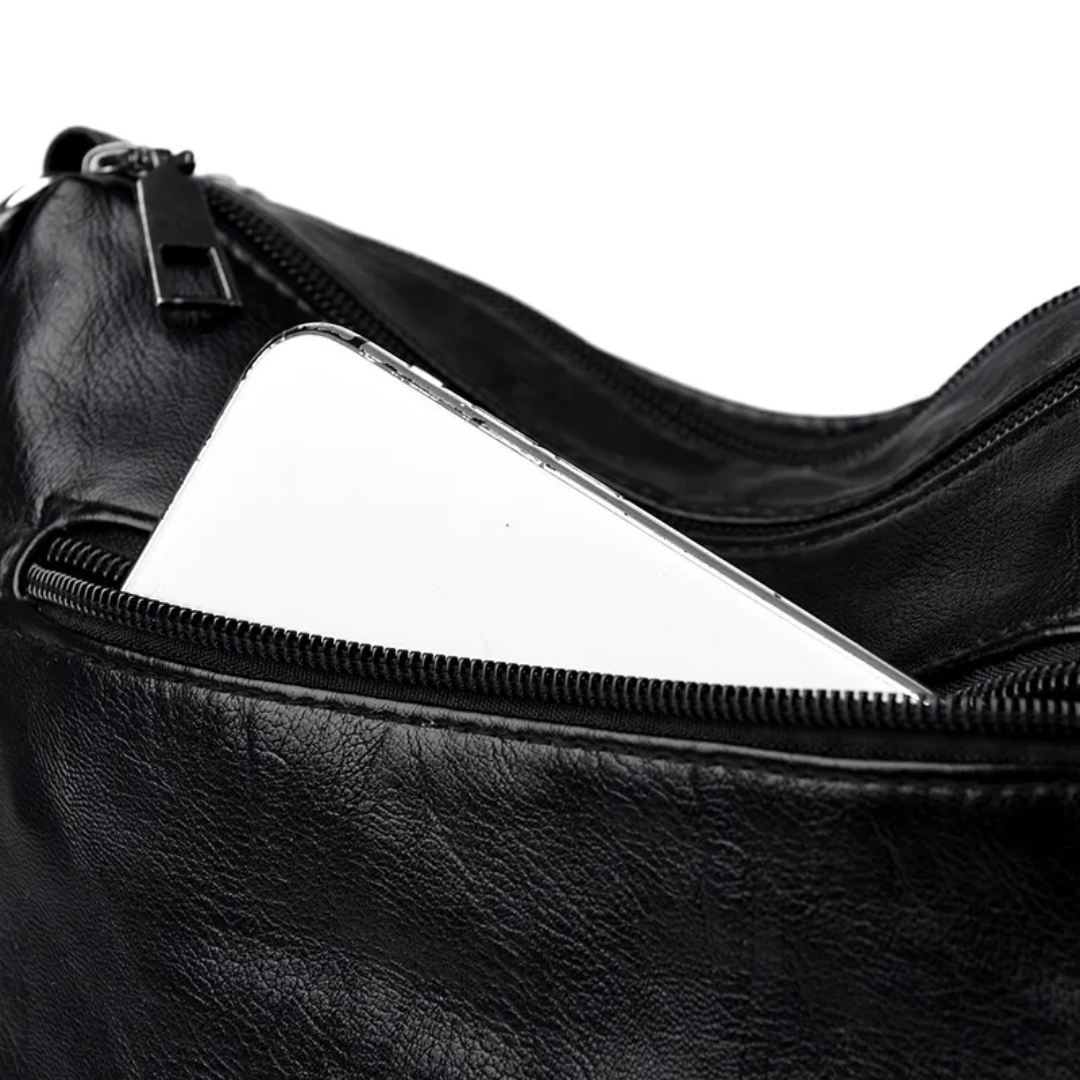 Carly Messenger Tas | Praktisch & vintage in de kleur Zwart voor dames in stijl geschikt voor alle seizoenen.