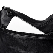 Carly Messenger Tas | Praktisch & vintage in de kleur Zwart voor dames in stijl geschikt voor alle seizoenen.