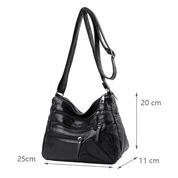 Carly Messenger Tas | Praktisch & vintage in de kleur Zwart voor dames in stijl geschikt voor alle seizoenen.