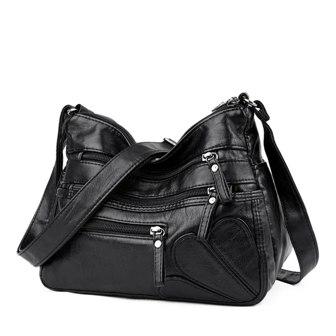 Carly Messenger Tas | Praktisch & vintage in de kleur Zwart voor dames in stijl geschikt voor alle seizoenen.