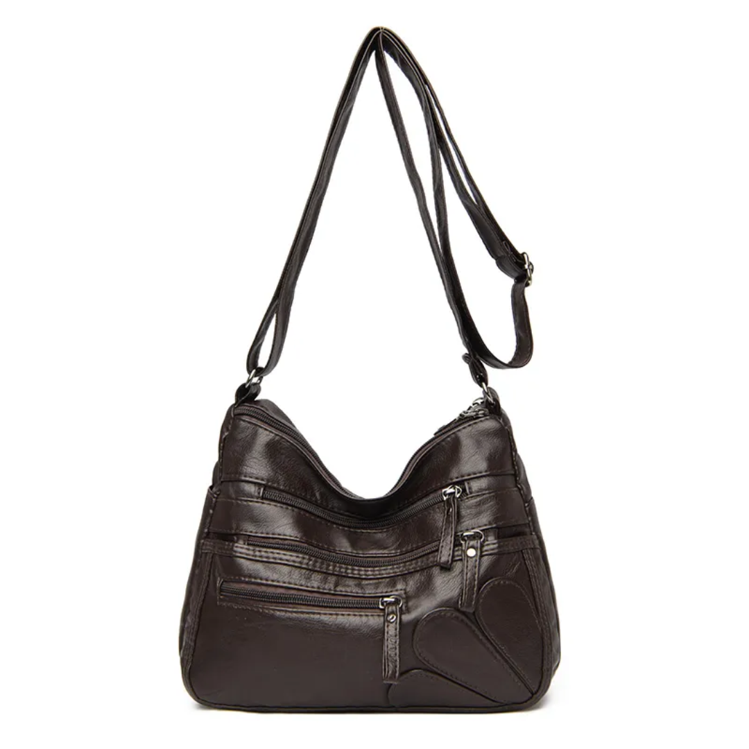 Carly Messenger Tas | Praktisch & vintage in de kleur Koffie voor dames in stijl geschikt voor alle seizoenen.