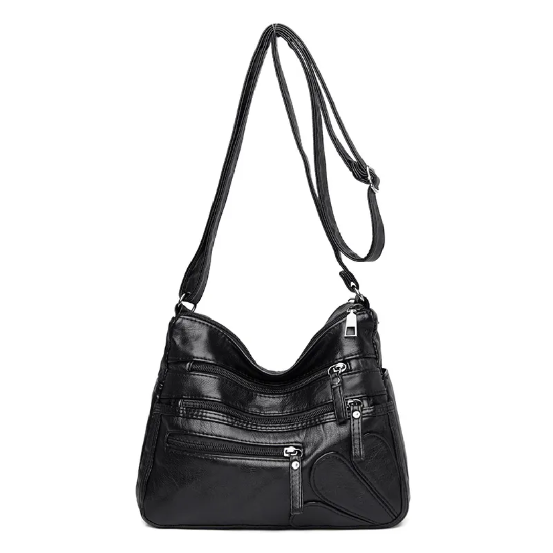 Carly Messenger Tas | Praktisch & vintage in de kleur Zwart voor dames in stijl geschikt voor alle seizoenen.