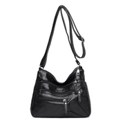 Carly Messenger Tas | Praktisch & vintage in de kleur Zwart voor dames in stijl geschikt voor alle seizoenen.