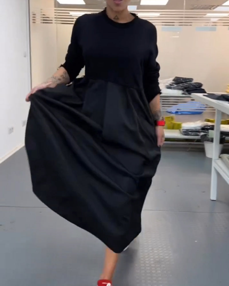 casual-lange-zwarte-a-lijn-jurk-deqalli-2.jpg