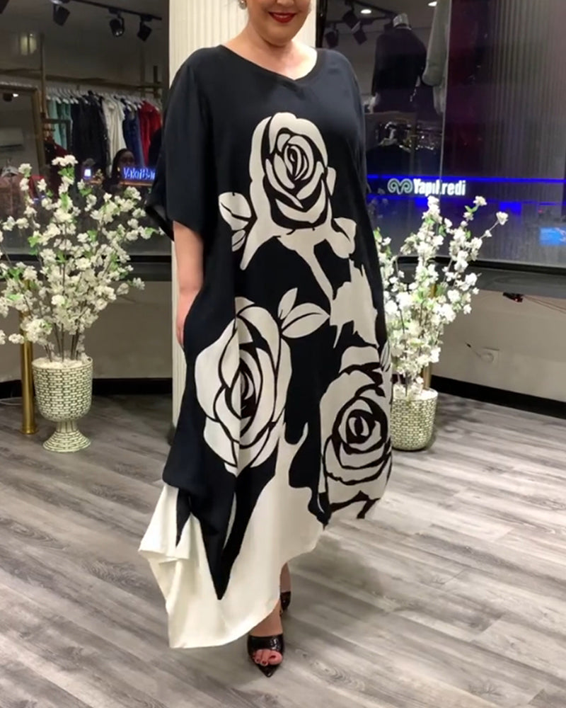 Casual losvallend jurkje met rozenprint in de kleur Zwart voor dames in stijl ideaal voor de herfst.