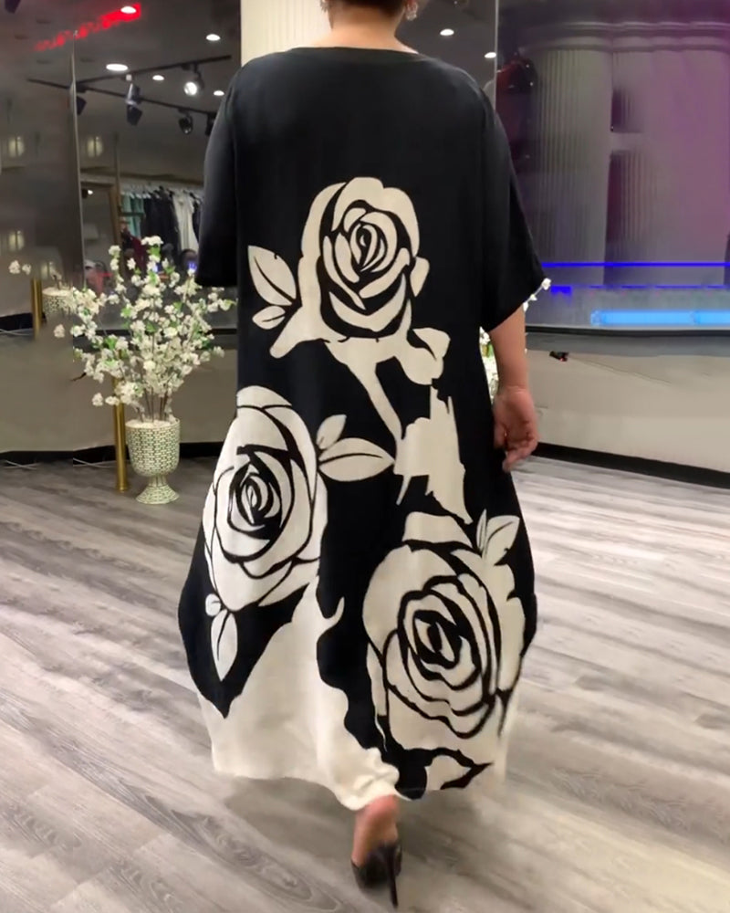 Casual losvallend jurkje met rozenprint in de kleur Zwart voor dames in stijl ideaal voor de herfst.