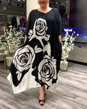 Casual losvallend jurkje met rozenprint in de kleur Zwart voor dames in stijl ideaal voor de herfst.