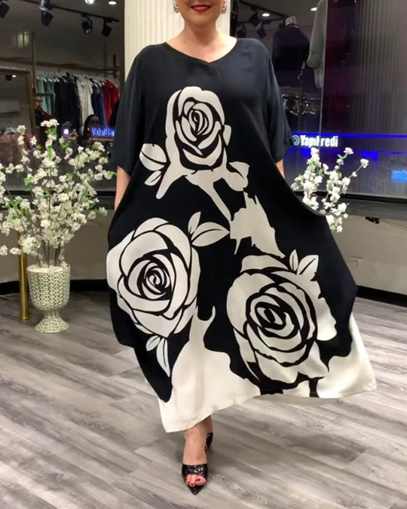 Casual losvallend jurkje met rozenprint in de kleur Zwart voor dames in stijl ideaal voor de herfst.