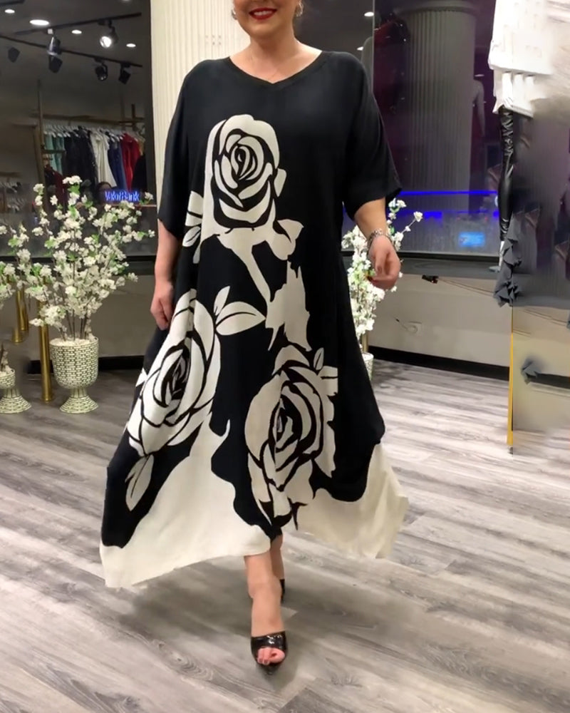 Casual losvallend jurkje met rozenprint in de kleur Zwart voor dames in stijl ideaal voor de herfst.