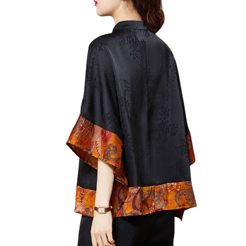 Chryssi | Fris en fruitig zomerjurkje in de kleur Zwart voor dames in stijl ideaal voor de lente.