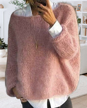 Danique Mell | Effen offshoulder pluizige trui in de kleur Roze voor dames in stijl ideaal voor de herfst.