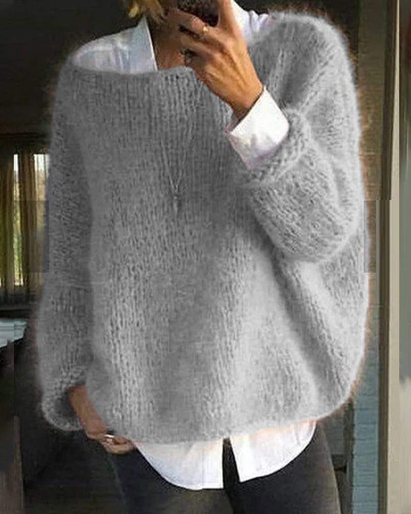 Danique Mell | Effen offshoulder pluizige trui in de kleur Roze voor dames in stijl ideaal voor de herfst.
