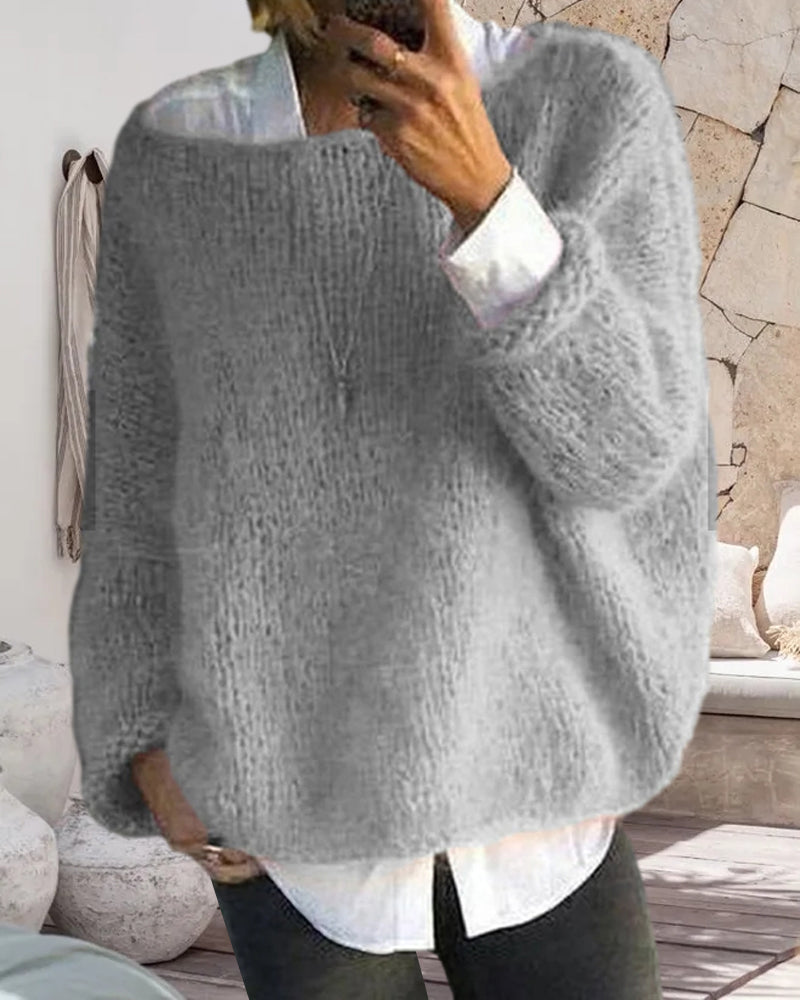 Danique Mell | Effen offshoulder pluizige trui in de kleur Roze voor dames in stijl ideaal voor de herfst.