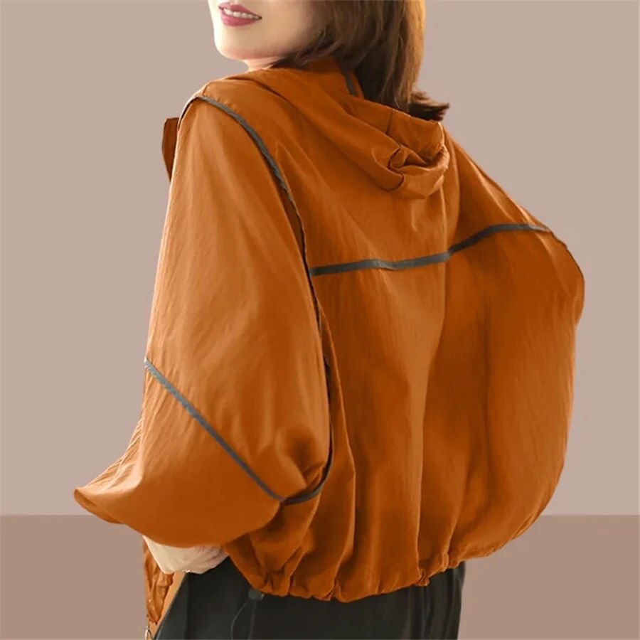 Danya | Luchtige zomer hoodie jas in de kleur Oranje voor dames in Lounge stijl ideaal voor de lente.